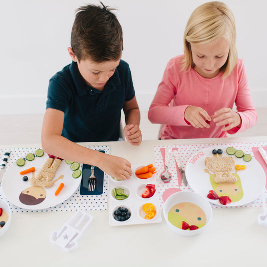 Boy and Girl decorating their Dylbug Personalized Little Me Dress up Plates for fun at mealtime, even for picky eaters