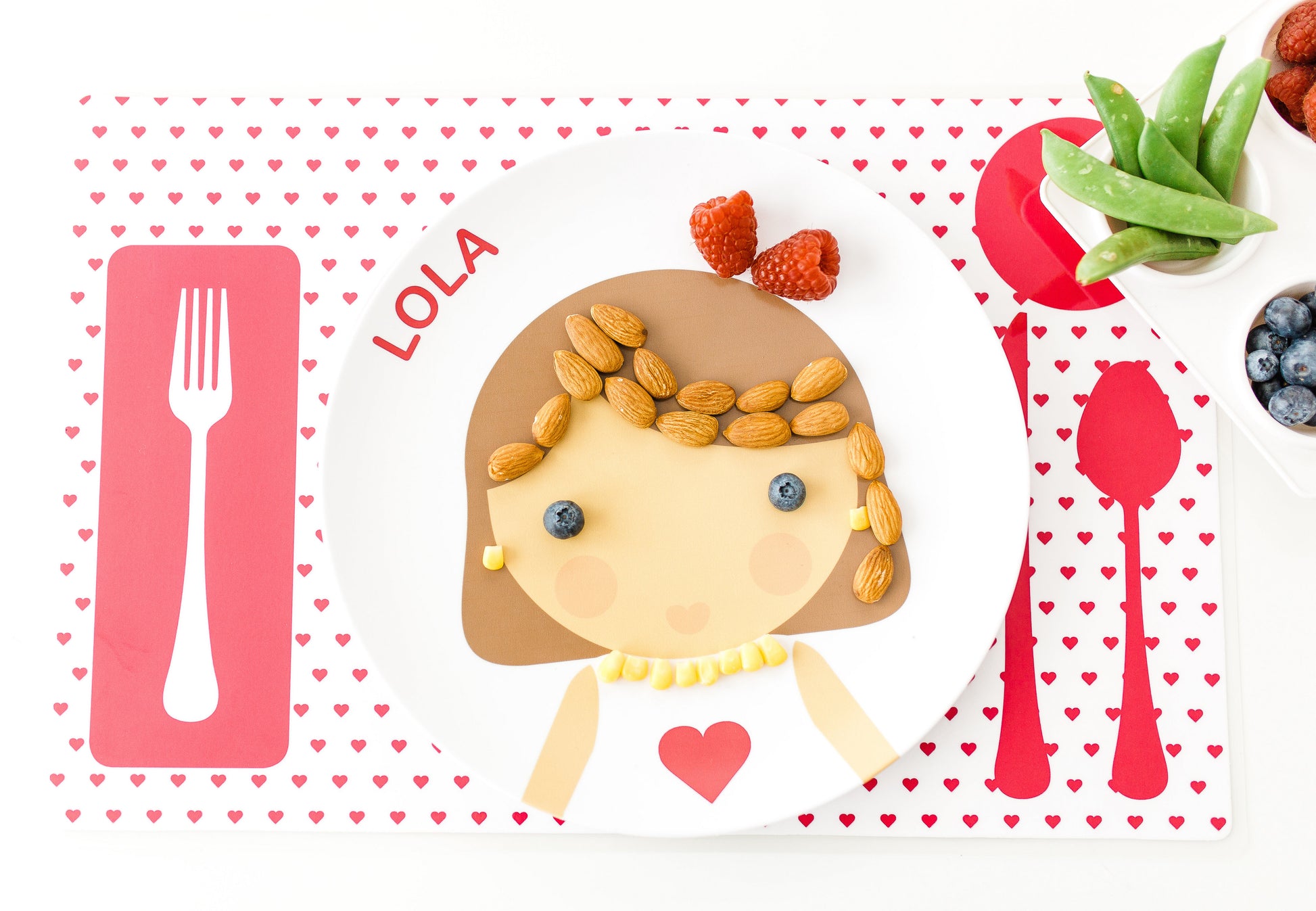 Dylbug personalized little me girl placemat in pink. Customize skin tone, hair color, hair style, eye color,  add glasses and freckles.