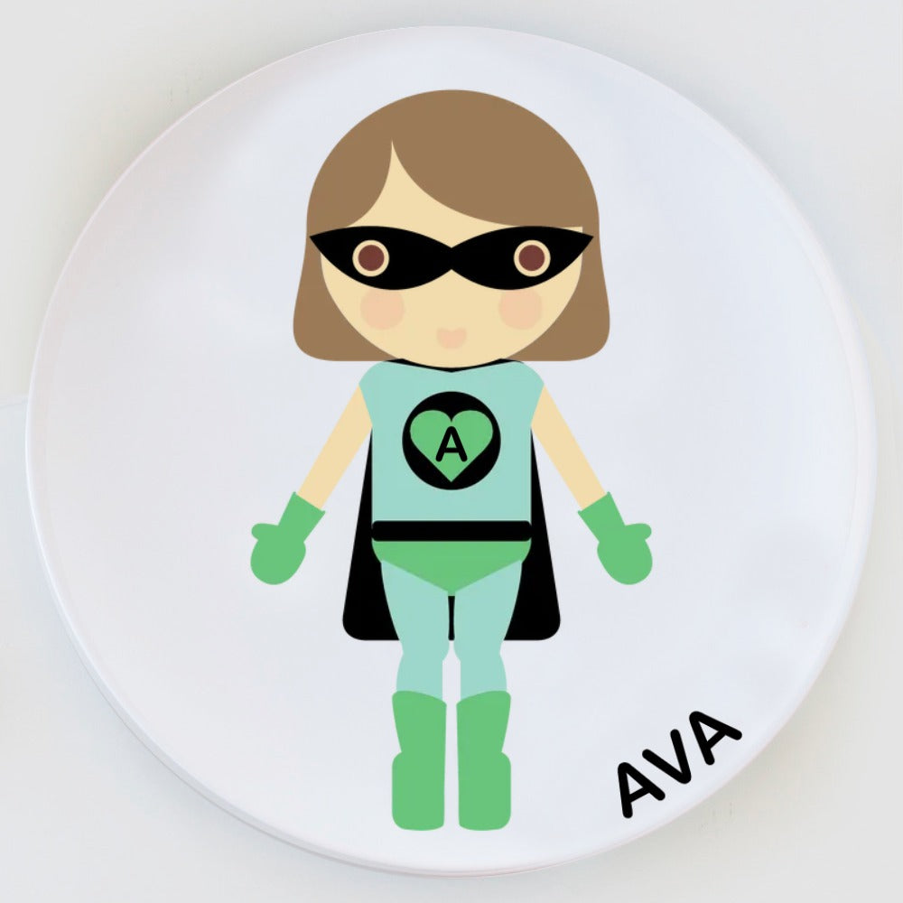 Dylbug personalized superhero girl plate in green. Customize skin tone, hair style, hair color, eye color to look just like your little one.
