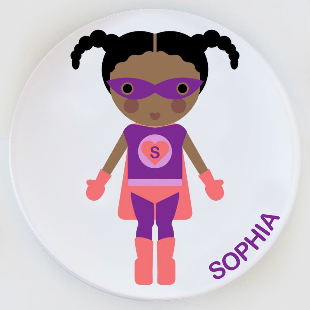 Dylbug personalized superhero girl plate in purple. Customize skin tone, hair style, hair color, eye color to look just like your little one.